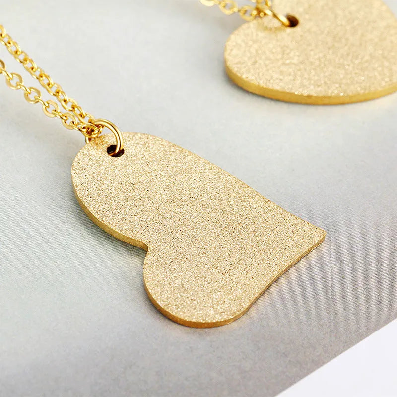 Geometric heart-shaped titanium steel necklace with Japanese and Korean fashion inspiration