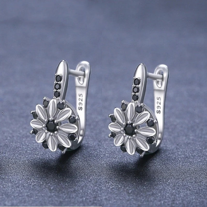Copper flower ear clips with zircon inlays for women, black colour variant