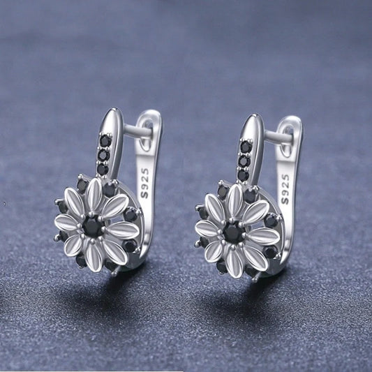Copper flower ear clips with zircon inlays for women, black colour variant
