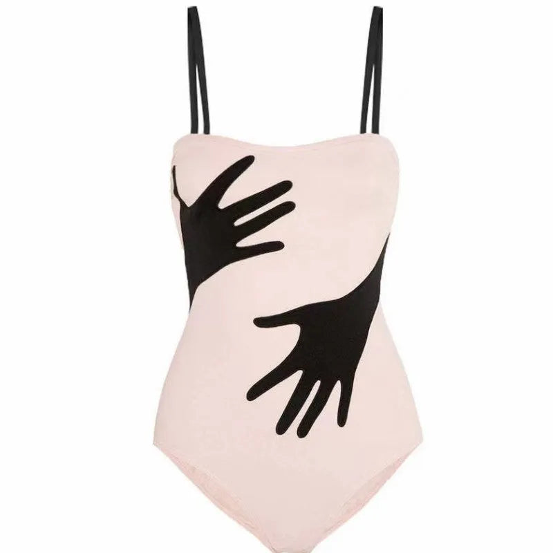 Women's one-piece bikini swimsuit with gauze skirt cover-up on beach