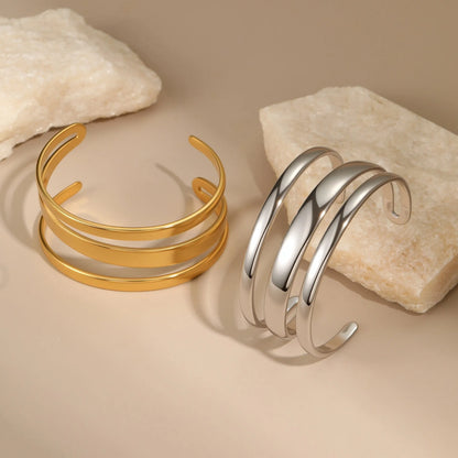 Geometric stainless steel bracelet with simple opening design and 18K gold electroplating