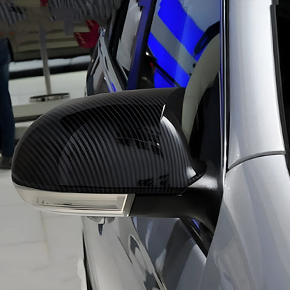 Pair of Horn Bright Black plastic outer reflector shells for Volkswagen Sagitar 2006-2011.