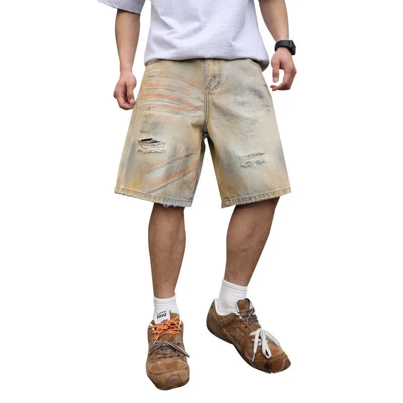 Men's light blue denim shorts with distressed finish and straight-leg silhouette