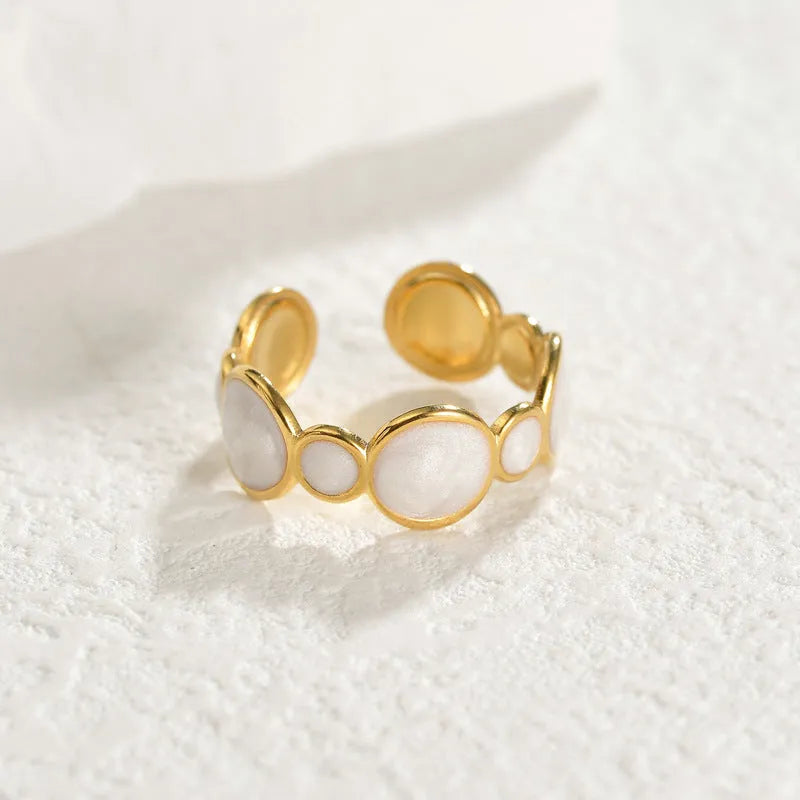 Adjustable opening stainless steel geometric ring with electroplating finish, designed for a secure and customisable fit that accommodates various finger sizes without the need for exact measurements.