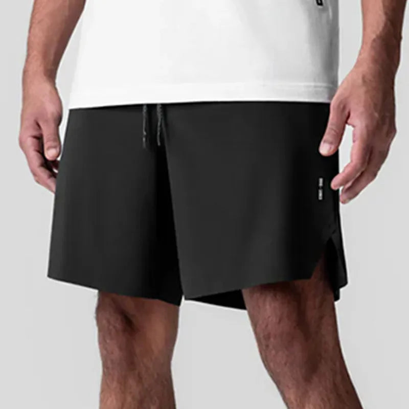 Men's seamless grey sports shorts in straight leg, knee-length quick-dry polyester design.