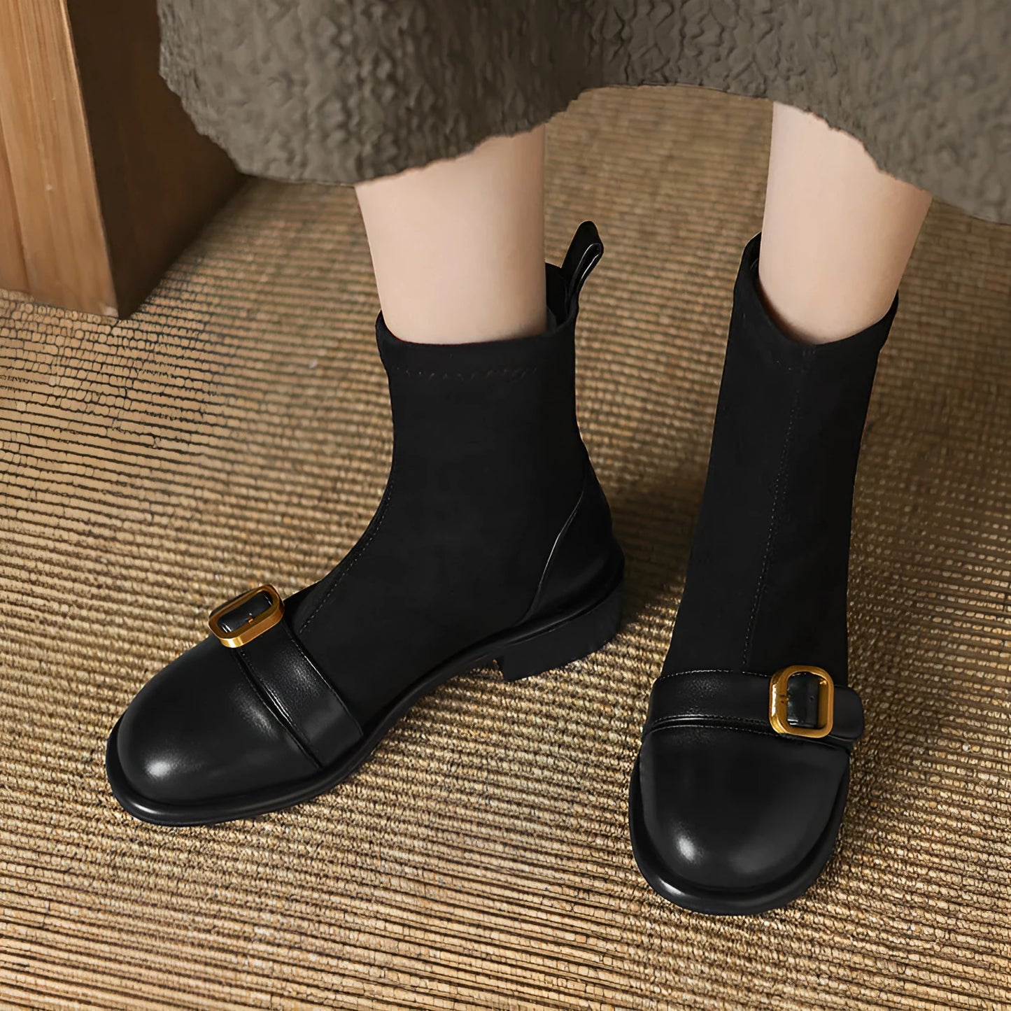 Women's black casual martin boots with low heel, lace-up front, and belt buckle stitching detail
