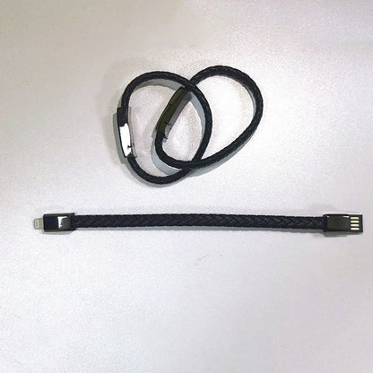 Stylish leather bracelet with built-in charging cable for smartphones and USB-C devices