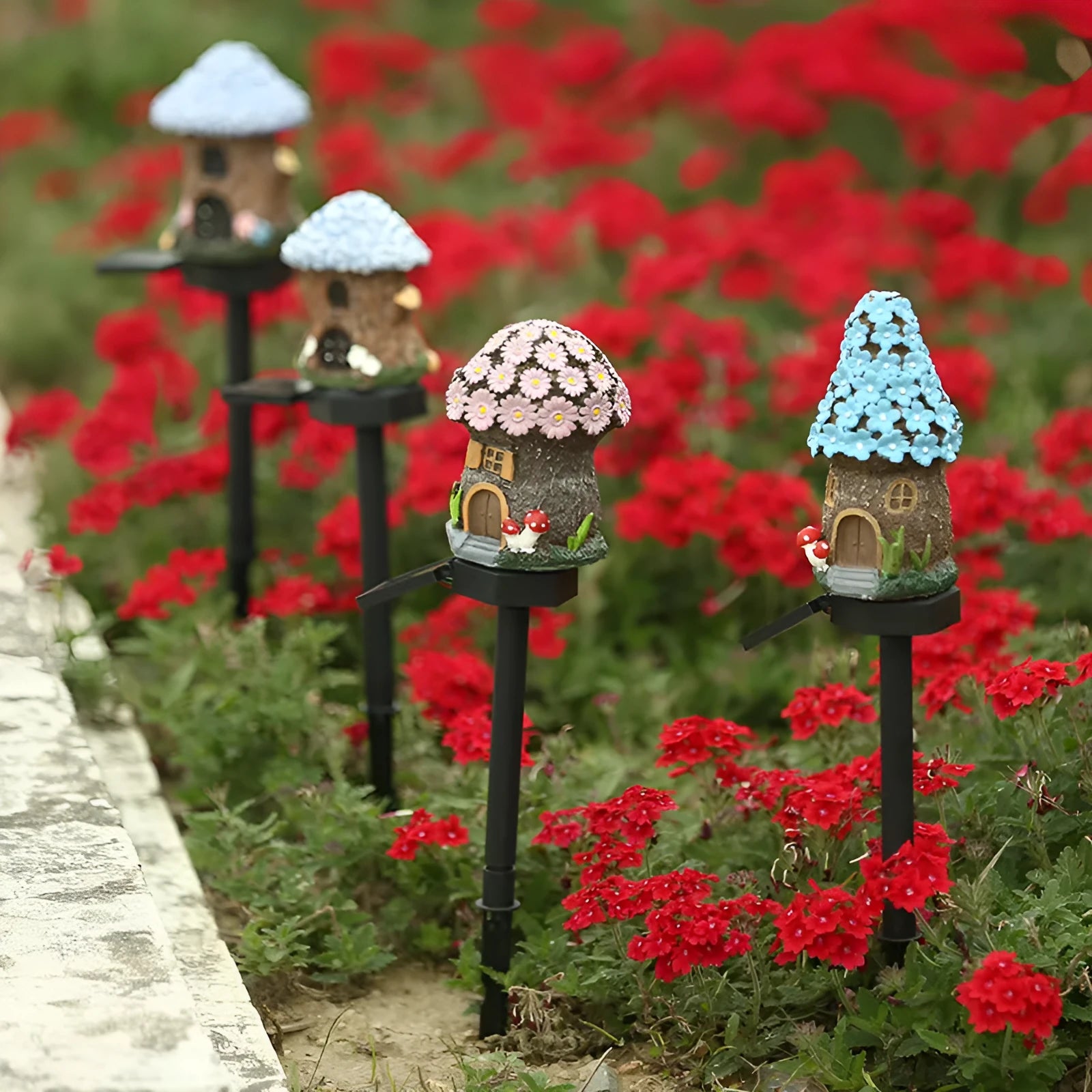 Flower-shaped solar garden light with resin housing for outdoor decorative lighting.