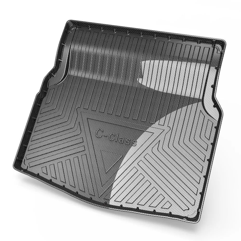 Black carbon fibre pattern tailored car boot liner mat fitted in an estate vehicle