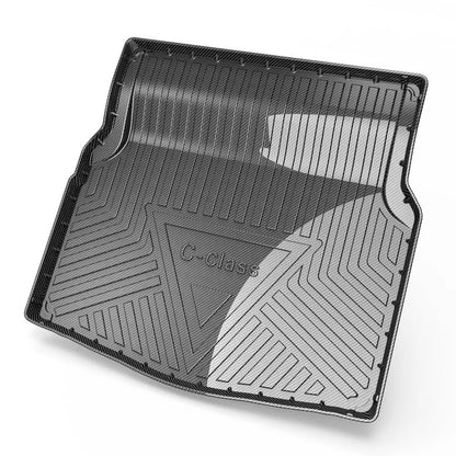 Black carbon fibre pattern tailored car boot liner mat fitted in an estate vehicle