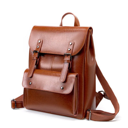 Genuine cowhide leather women's computer backpack in black, shown from a front perspective.