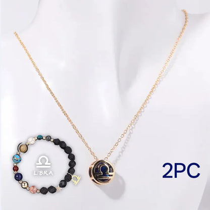 A natural stone beaded necklace and matching bracelet set laid flat, showcasing varied bead colours and textures.