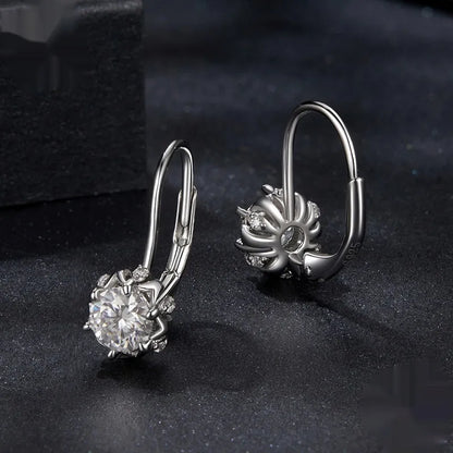 Sterling silver flower bud clip earrings with moissanite and white gold plating