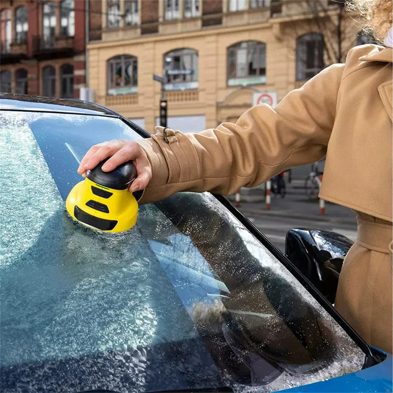 Yellow cordless electric snow scraper with USB charging cable for car window ice removal