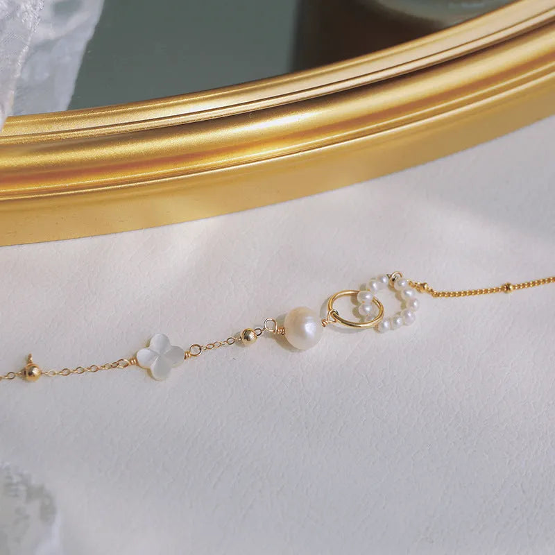 Natural pearl bracelet for women crafted with 14k gold-plated fittings and a timeless clasp-fastened design, a jewellery staple suitable for formal events and everyday wear in the featured colour as shown