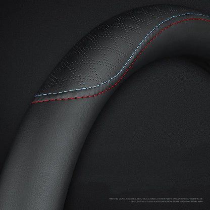 Black universal car steering wheel cover with a Napa leather texture and a two-colour line design, showing a 38cm diameter.