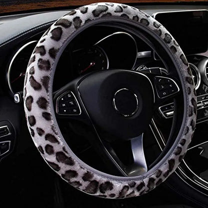 Short plush steering wheel cover in one of seven colours, fitting a 38cm steering wheel with non-slip grip