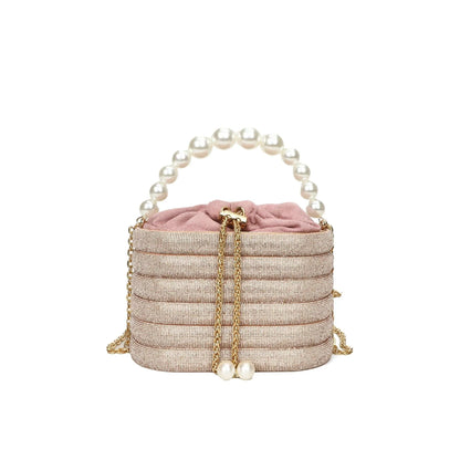Women's one-shoulder crossbody bag with pearl beading, round shape, and internal zipper pocket in black colour