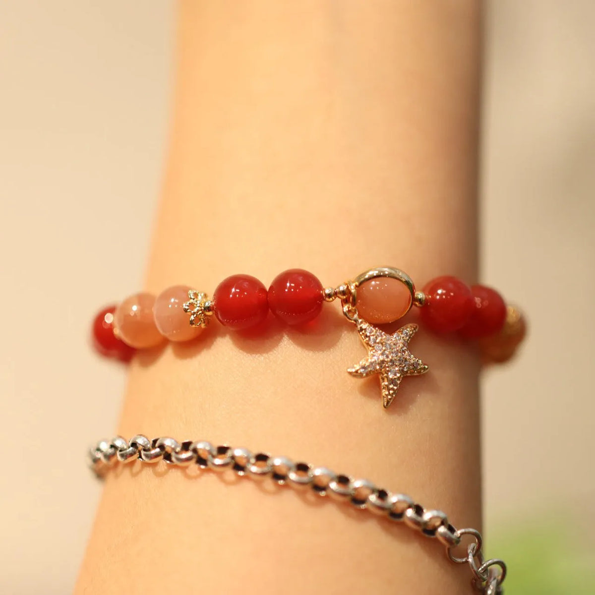 Handmade red agate and sunstone ethnic bracelet with star and Xiangyun designs for women