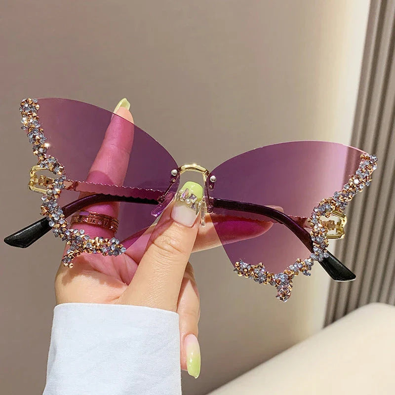 Chic butterfly-shaped sunglasses with diamond accents in various gradient color options