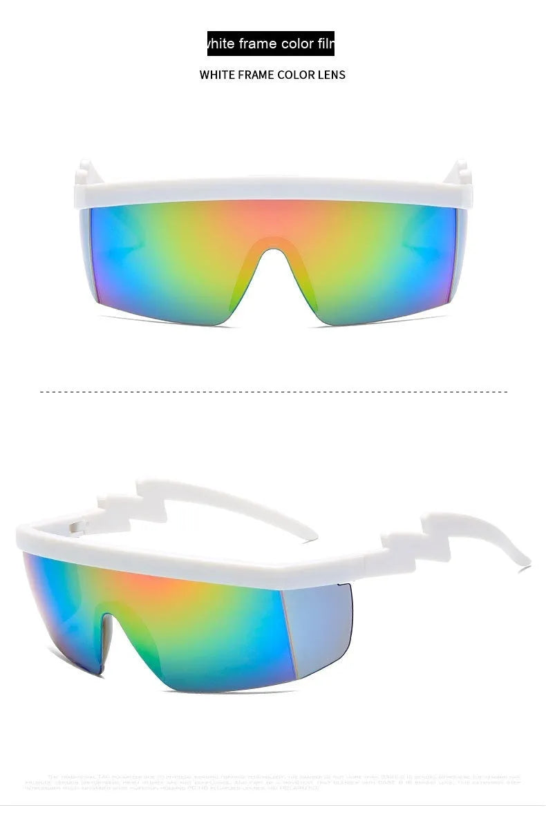 Black one-piece cycling sunglasses with blue polycarbonate lenses and lightning leg temples on a grey background.