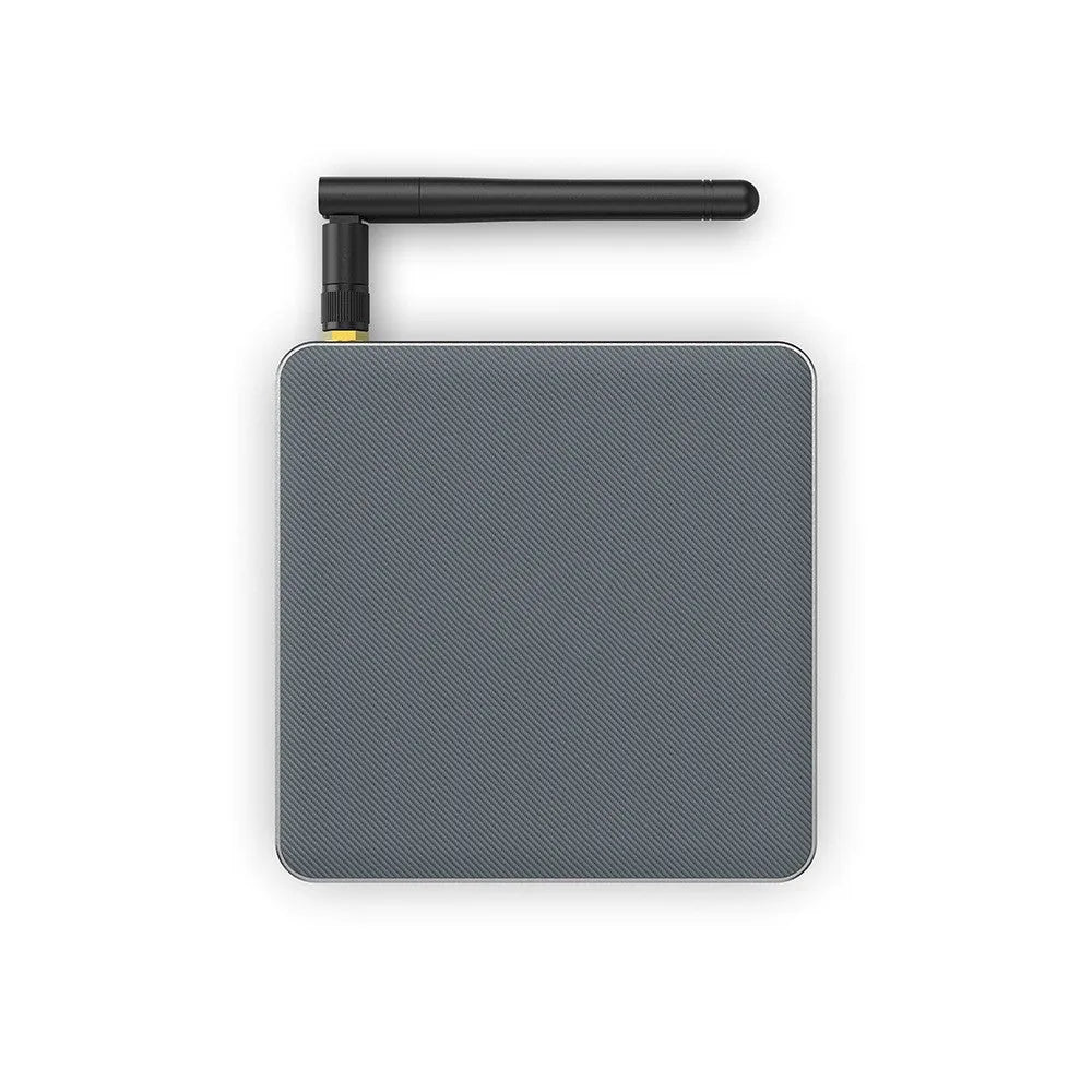 Android TV set-top box with remote control, supporting 8K resolution and Bluetooth.