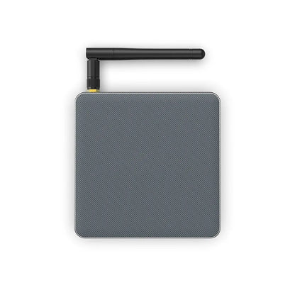 Android TV set-top box with remote control, supporting 8K resolution and Bluetooth.