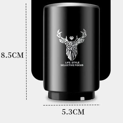 Stainless steel automatic bottle opener measuring 8.4 cm by 5.3 cm on a kitchen counter