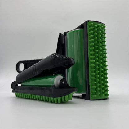 Green and yellow washable adhesive lint rollers for pet hair removal on a fabric background.