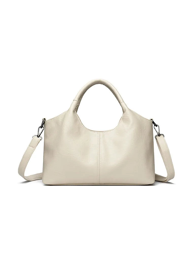 Women's soft genuine leather large crossbody bag shown in available colours: black, brown, wine red, yellow, beige, bronze, green.