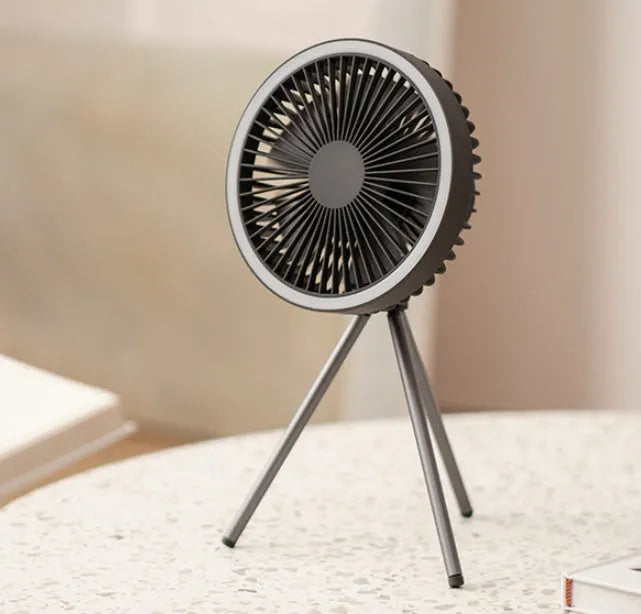 White camping fan mounted on aluminum tripod with Type-C charging cable