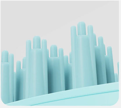 Blue and green pet bath brushes with soft TPR bristles and plastic handles for dog grooming