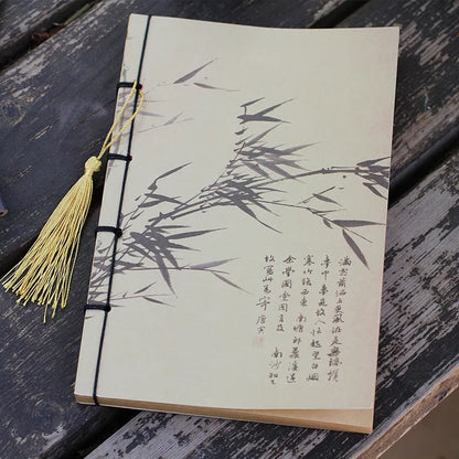 A5 antique wire-bound notebook with classical artwork cover, black oil wax rope binding, and decorative tassels