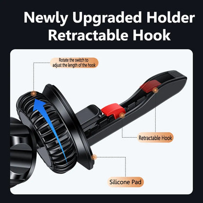 Silver magnetic car phone holder attached to a car air vent, showing a mobile phone secured to it.