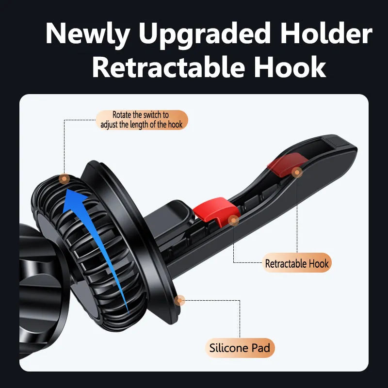 Silver and black magnetic car phone holder clipped onto a car air vent, showing adjustable ball joint.