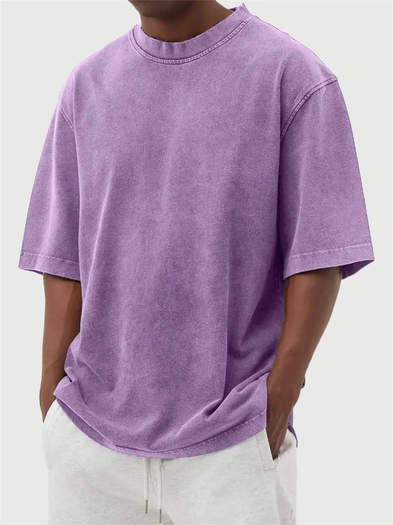 Men's loose fit stone-washed distressed short sleeve t-shirt in solid colour