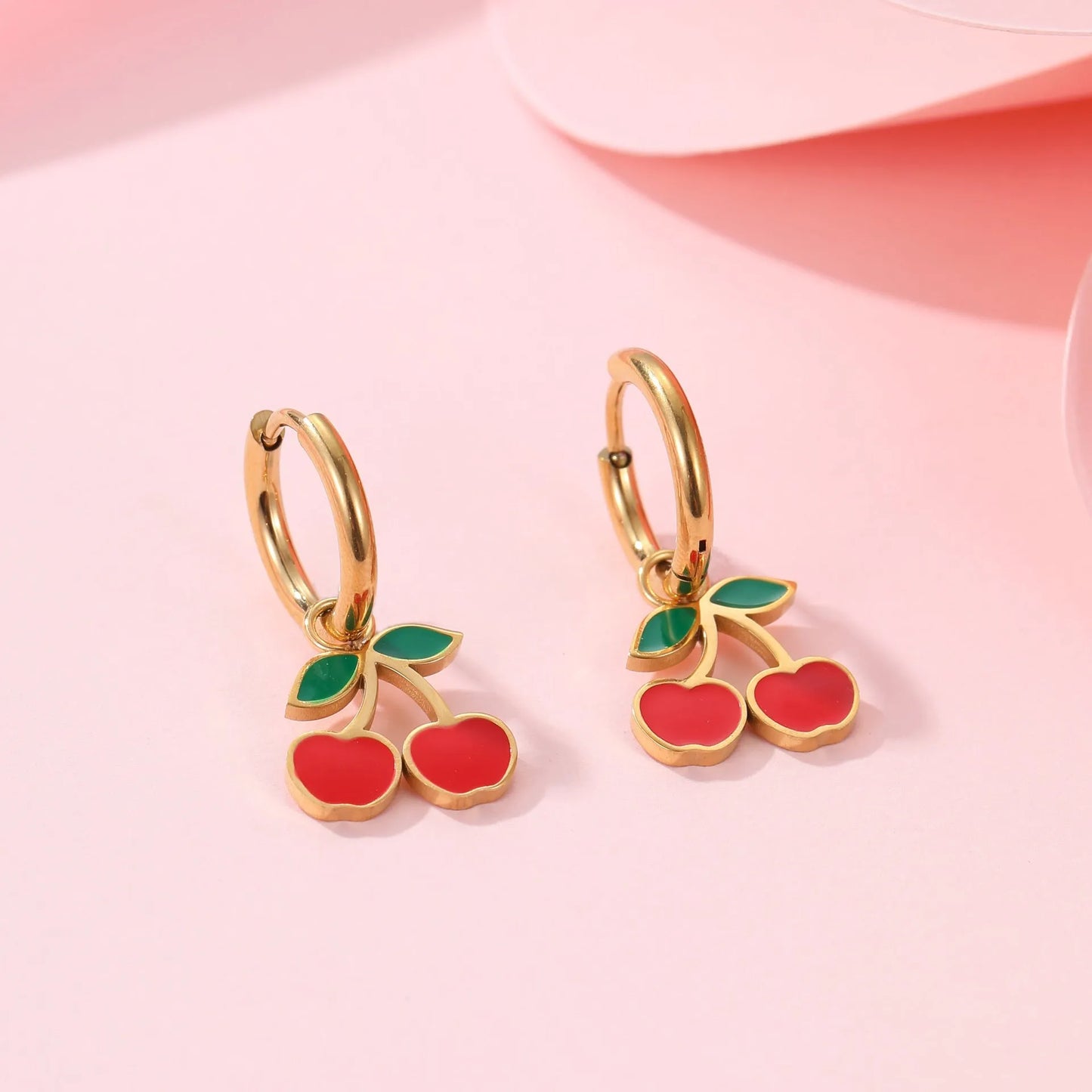 Cherry jewellery set with necklace, bracelet, earrings and ring in gold electroplated stainless steel with geometric fruit design