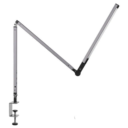 Adjustable aluminium desk lamp with remote control, shown in black with a clip attached to a desk edge.