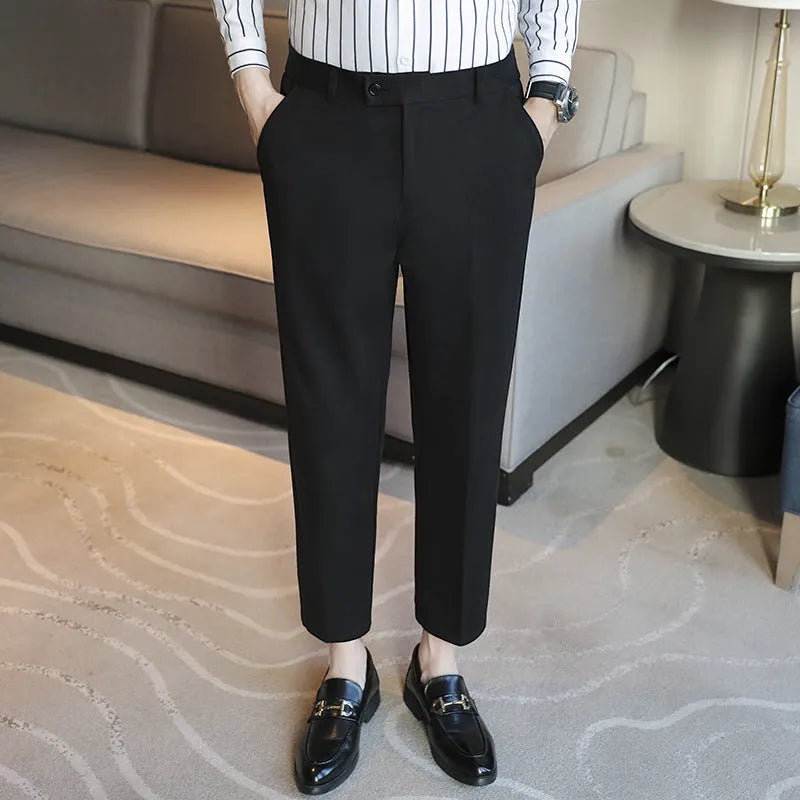 Straight-leg brown corduroy trousers with elastic waistband on size chart