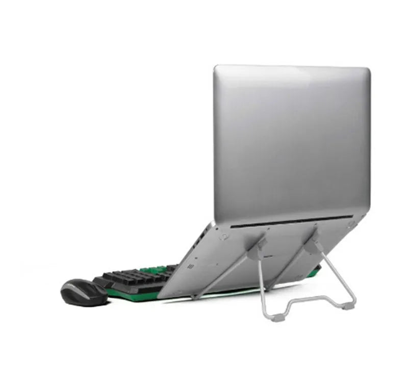 Grey aluminium and plastic adjustable stand holding a mobile phone on a wooden desk.