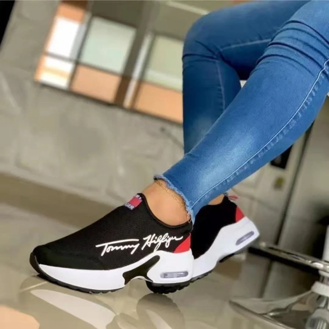 Women's slip-on sneakers with air cushion and mid heel in white, red, black, navy blue