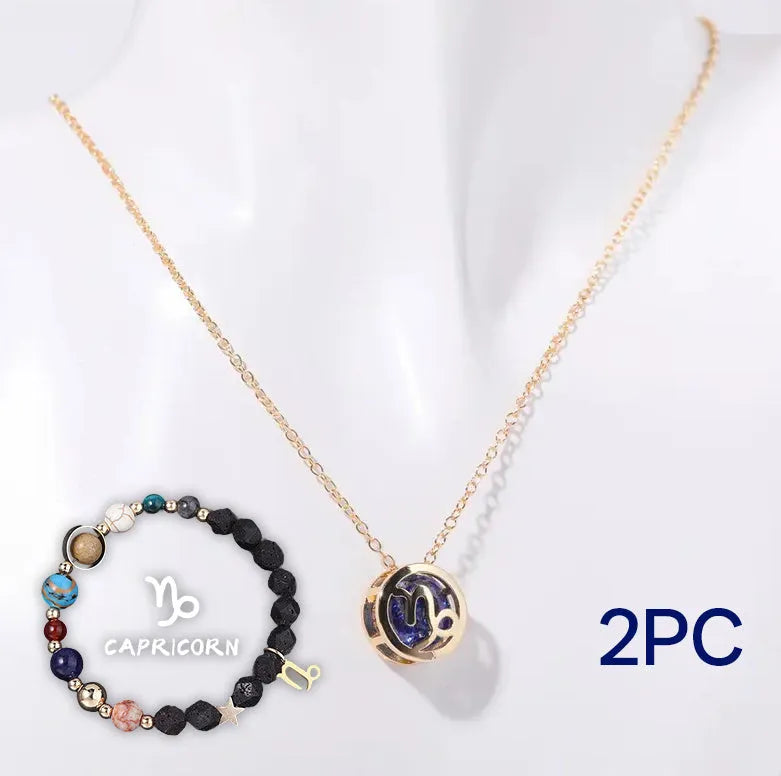 A natural stone beaded necklace and matching bracelet set laid flat, showcasing varied bead colours and textures.