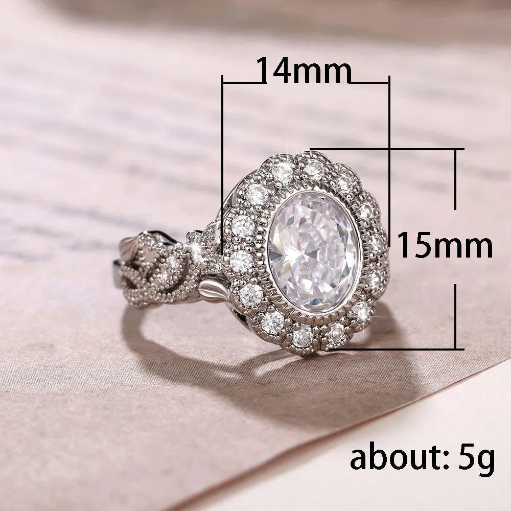 Round zircon ring with geometric design in F1770 white gold colour plating, available sizes 6 to 10