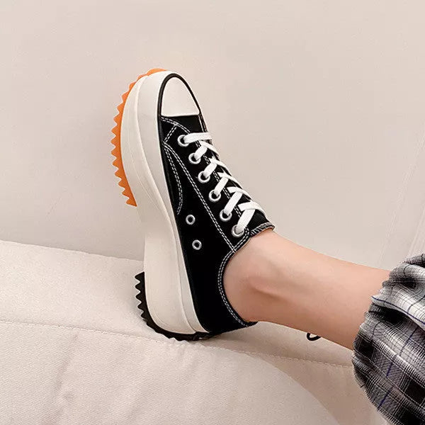 Women's thick-soled canvas shoes in white, black, and black high top options