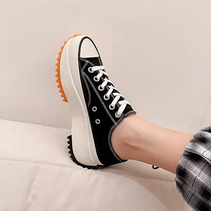 Women's thick-soled canvas shoes in white, black, and black high top options