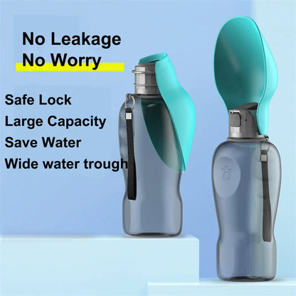 Blue grey portable dog water bottle with fold-out drinking bowl, shown with a wrist strap.