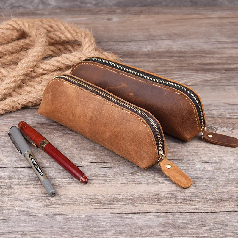 Square leather pencil case in genuine cowhide measuring 18cm with zipper closure