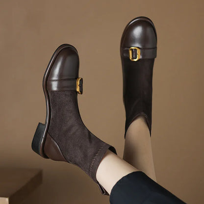 Women's black casual martin boots with low heel, lace-up front, and belt buckle stitching detail