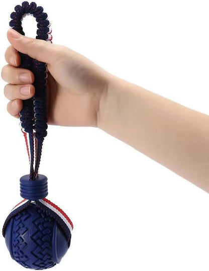 Blue dog ball with rope toy showing 6.5cm diameter textured rubber ball on 29cm rope for dental cleaning and tug-of-war