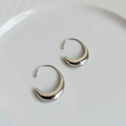 Women's snake motif alloy earrings with gold electroplated finish